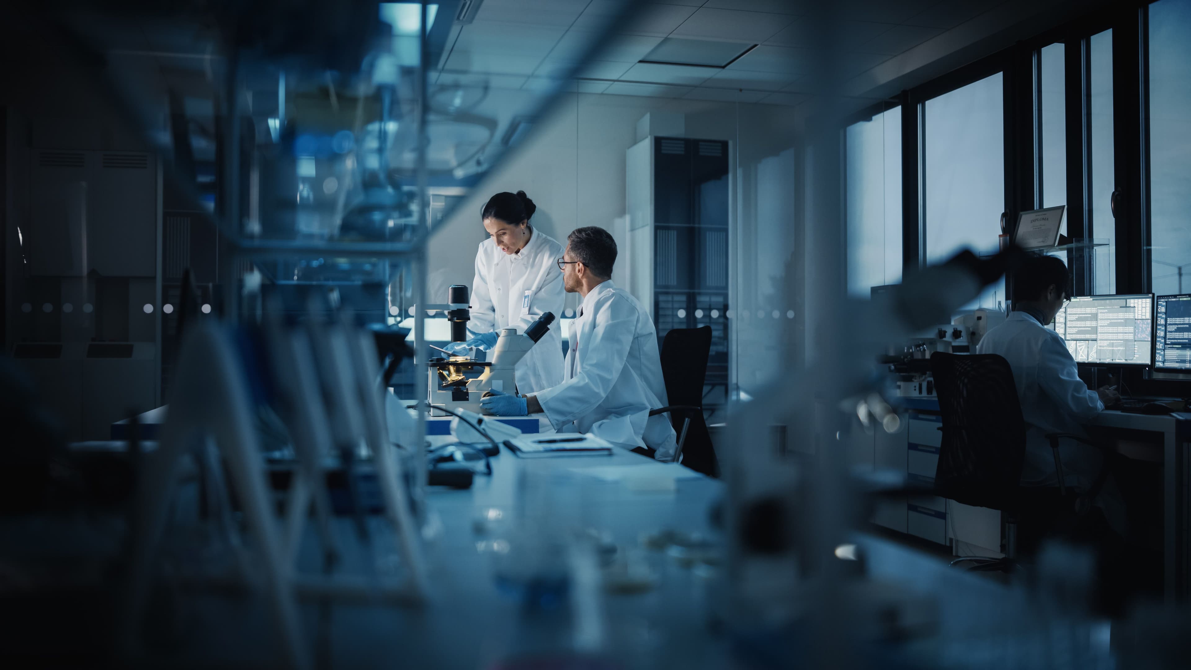 Stability analyst working in a GMP-compliant laboratory